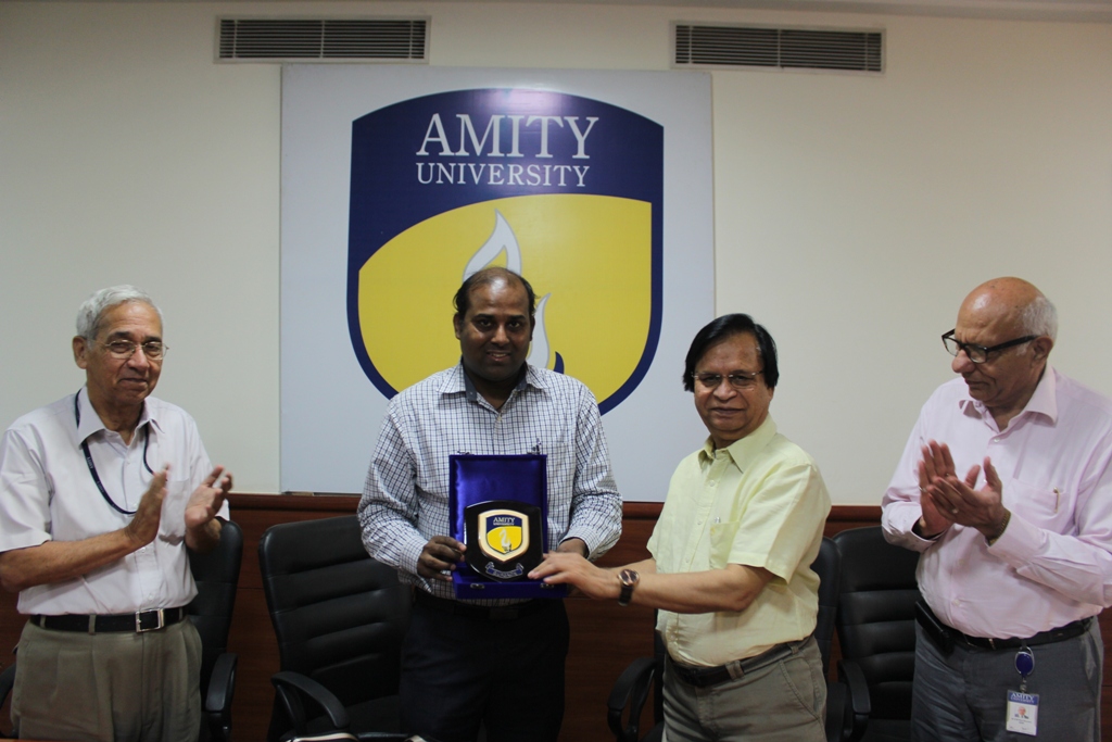 Dr. Raj Kumar Receiving Momento from Members of Amity University